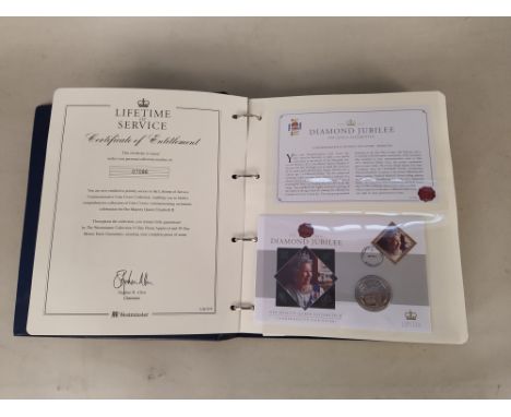 An album of commemorative coins first day covers, eighteen in total, issued by The Westminster Company