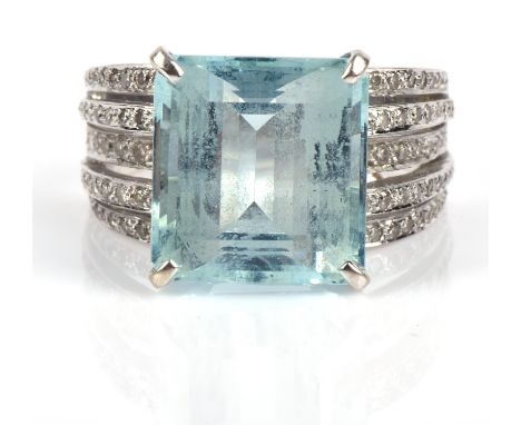 Aquamarine and diamond cocktail ring, central emerald cut aquamarine estimated weight 8.30 carats, with diamond set shoulder,