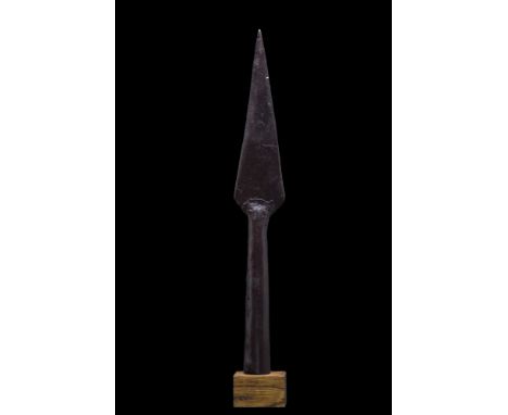 Ca. 900-1100 AD.An iron spearhead with a pointed, leaf-shaped blade, flaring neck, and tubular socket. The era known as the V