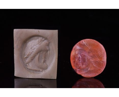 Ca. 100-300 AD.A carnelian ring stone with a left-facing portrait of Zeus, the god of the sky, lightning, and thunder, who wa