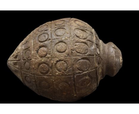 Ca. 800-1000 AD.A ceramic grenade also referred to as "Greek Fire". This hollow vessel is acorn-shaped with a short neck and 