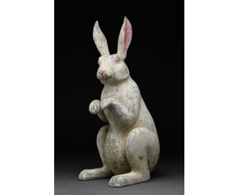 Ca. 206 BC - 220 AD.An attractive, hollow-formed terracotta rabbit figurine with a white pelt and coral-pink pigmentation on 