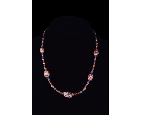 Ca. 100-500 AD.A beautiful necklace composed of assorted carnelian, stone, and gold beads from the Pyu Dynasty. Restrung on a