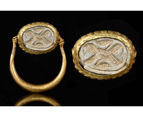Hyksos Period, Ca. 1630-1523 BC.A beautiful high karat gold swivel ring with a steatite scarab from Ancient Egypt depicting a