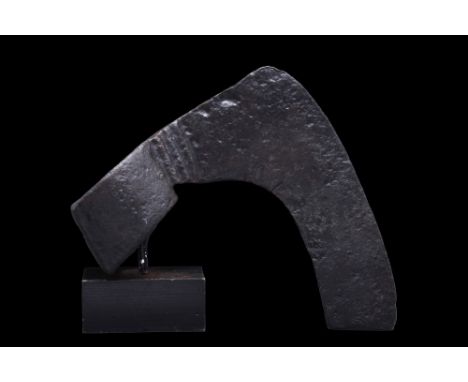 Ca. 900-1100 AD.An iron bearded axe head with an elongated, heavy blade and a round socket. One side of the blade features an