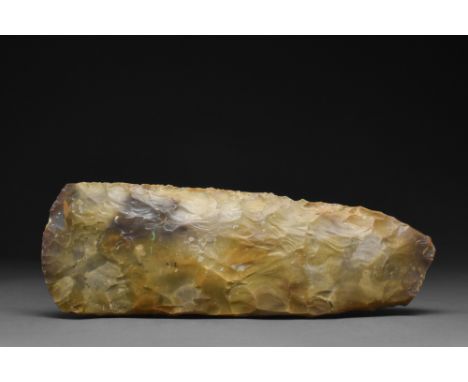 Ca. 4th - 2nd millennium BC.A knapped axe head with rounded butt and D-section cutting edge.Size: L:190mm / W:250mm ; 1.14KgP