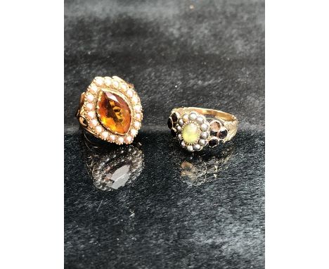 2 x Unmarked Yellow metal Rings (1) 18th Century Oval approx: 12.4mm x 10.4mm across and set with a small (rubbed) foil backe