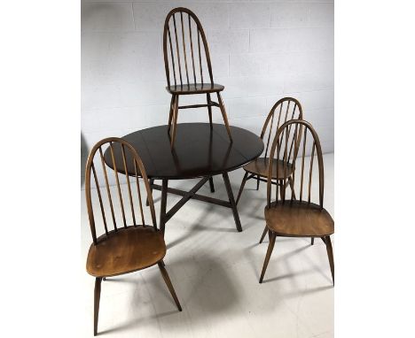 Ercol Dining table and four Stick back chairs 