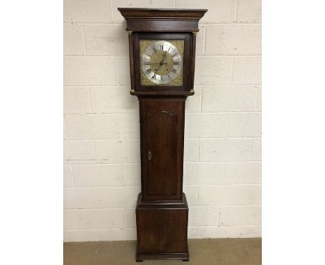 An oak longcase clock, the square brass 30cm dial with  leaf scroll, Roman and Arabic chapter ring, inscribed 'Isaac Hewlett,