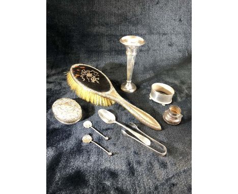 Collection of hallmarked silver to include a candle stick, sugar nips, spoons etc (approx 137g excluding the brush)