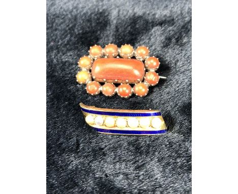 2 x Victorian Brooches (1) Yellow metal (gold) Coral brooch set with an approx: 10mm x 21mm central stone and surrounded by 1