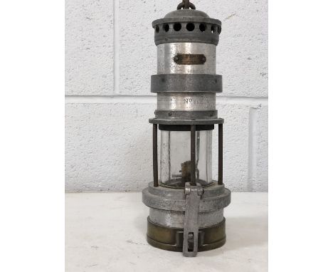 MINER'S LAMP bearing brass label for Thomas &amp; Williams, Aberdare, complete with hanging hook approx 25cm tall