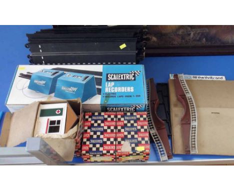 Scalextric Track, First Aid Hut, Two hand Throttles, lap Recorder and Catalogue Condition report: see terms and conditions.