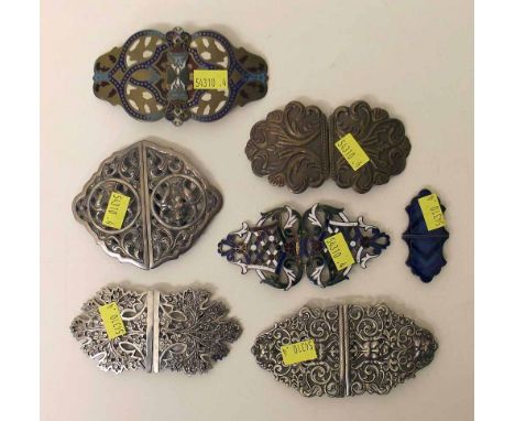 Seven various enamel and metal buckles. Condition report: see terms and conditions.