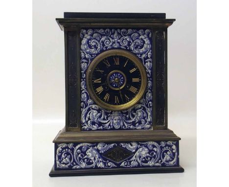 Victorian mantel clock with ceramic panels. Condition report: see terms and conditions.