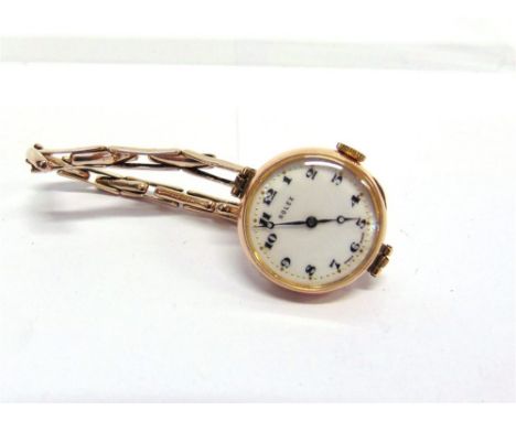 ROLEX, A LADY'S 9 CARAT GOLD WRISTWATCH Glasgow import marks for 1924, white enamel dial with black hands and Arabic numerals