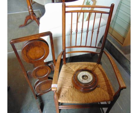 AN OAK AND STAINED BEECH RUSH SEAT ARMCHAIR  with turned spindle back; a patent oak folding oak cakestand with trade label 'T