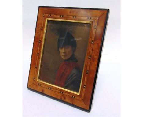 E.W. PANNELL (BRITISH, EARLY 20TH CENTURY) Portrait of a Lady in a Feathered Hat, gouache on card, signed lower left, 19cm x 
