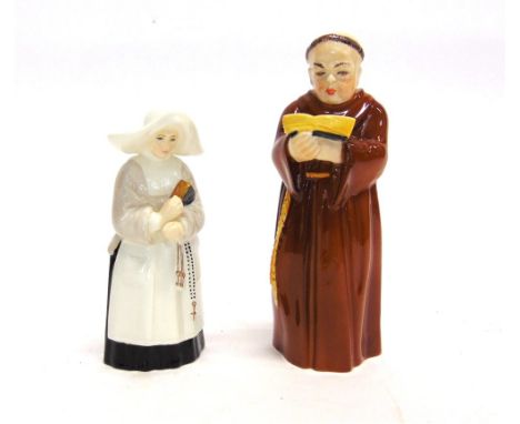 TWO ROYAL WORCESTER CANDLE SNUFFERS  in the form of a nun and a monk, 9.5cm and 12.5cm high