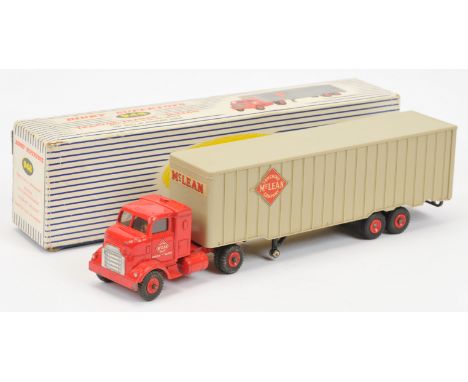 Dinky Toys 948 "McLean" Tractor and Trailer - Red cab and plastic hubs with black treaded tyres, light fawn trailer. Conditio