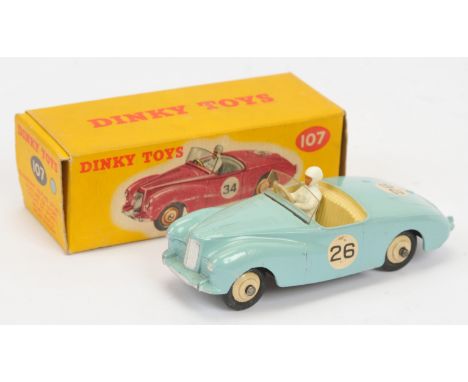 Dinky Toys 107 Sunbeam Alpine Sports Car - Light blue, pale cream interior with figure driver, silver trim, light beige rigid