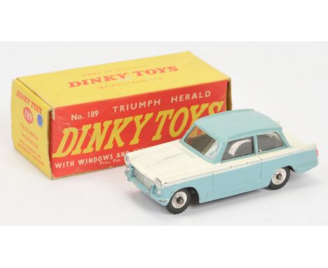 Dinky Toys 189 Triumph Herald Saloon - Two-Tone white and light blue, silver trim and spun hubs with black treaded tyres. Con