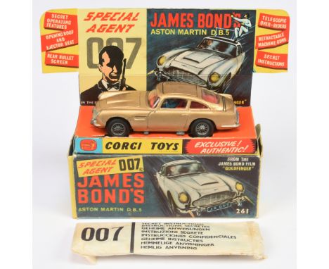 Corgi Toys 261 "James Bond" Aston Martin DB5 From "Goldfinger" - Gold body, red interior with "James bond &amp; Bandit" figur