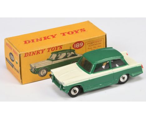 Dinky Toys 189 Triumph Herald Saloon - two-tone green, and white, silver trim and chrome spun hubs with black treaded tyres. 