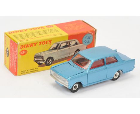 Dinky Toys 136 Vauxhall Viva - blue body, red interior, silver trim and spun hubs with black treaded tyres. Condition is Near