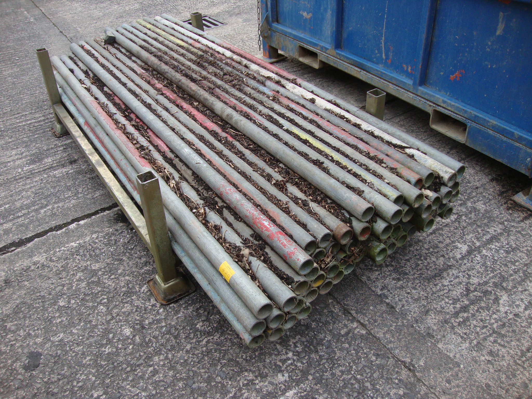 Stillage and contents of scaffold pole. NB. Circa 5060 pieces in total