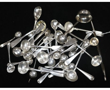 A small silver toddy ladle and a collection of Georgian and later silver condiment spoons