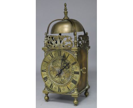 A brass lantern clock