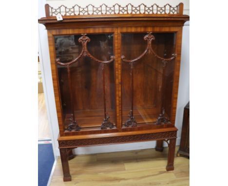 A Chippendale style carved mahogany glazed display cabinet, W.107cm H.146cm