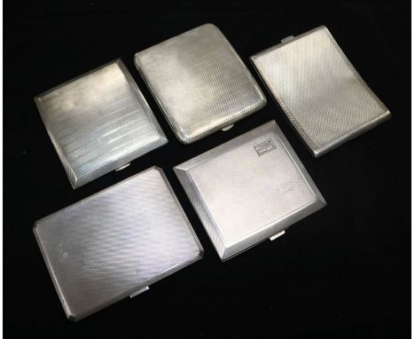 Five silver engine-turned cigarette cases, some inscribed