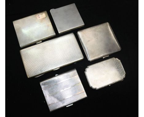 A silver combined cigarette and match book case and five small silver engine-turned cigarette cases