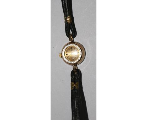 A lady's 9ct Omega manual wind wrist watch.