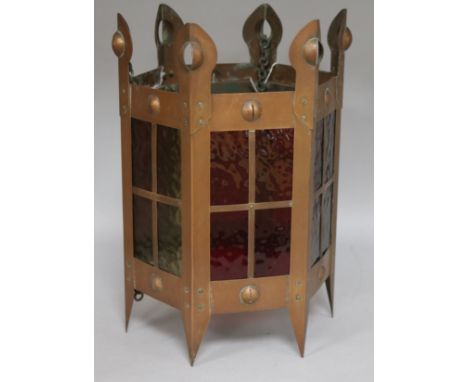 An Arts & Crafts copper and coloured glass hall lantern