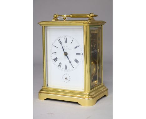 A gilt brass carriage clock with alarm