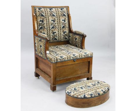 A 19th century French walnut commode chair, with an oval footstool, upholstered ensuite W.2ft 1in. H.3ft 6in.