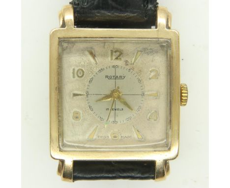 ROTARY: 9ct gold cased gents wristwatch, 17 jewel movement, square dial on black leather strap, no working at lotting, ticks 