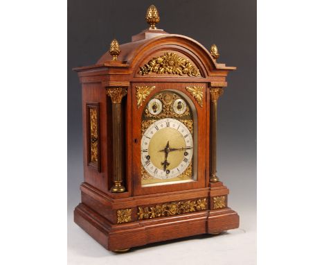 An early 20th Century large continental German oak three-train chiming bracket / mantel clock by Winterhalder &amp; Hoffmeier