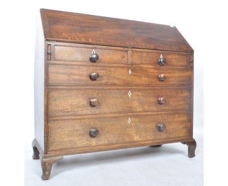 A good large early 19th century Georgian / George III bureau.&nbsp; The fall front slope supported by extending loafers havin