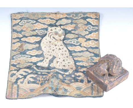 A North Korean military Joseon Dynasty embroidered silk Mandarin Square or Rank Patch having a recumbent leopard / temple lio