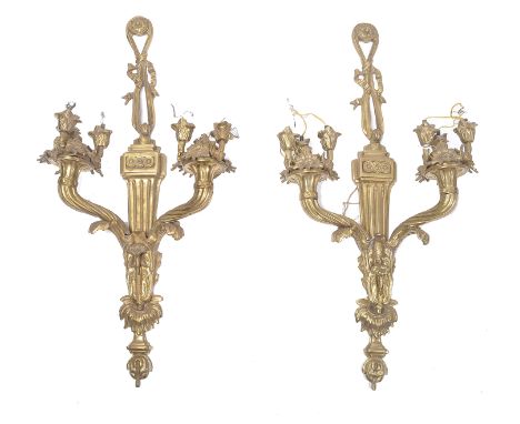 A pair of large 19th century classical gilt metal ormolu worked wall light sconces. Adams revival with twin scrolled arms and