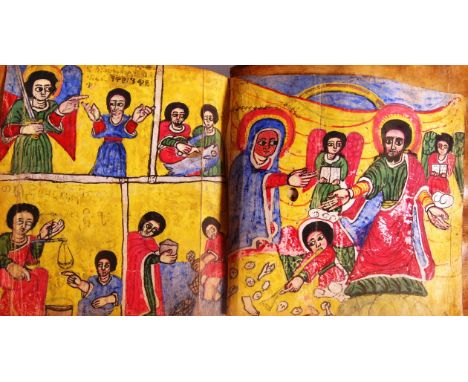 An incredible rare 19th century Ethiopian prayer book manuscript - hand written in coptic language in red and black, with occ
