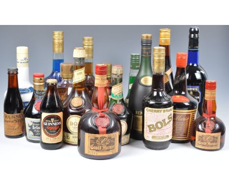 A collection of 18x bottles of assorted alcohol comprising: Contreat Extra Dry Liqueur, Tia Maria, Cusenier Apricot Brandy, G