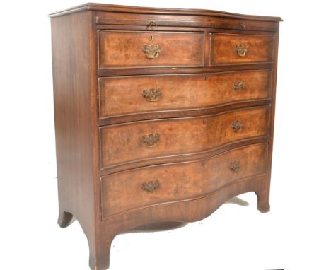A good early 20th century Georgian revival bachelors walnut serpentine fronted chest of drawers. Raised on bracket feet havin