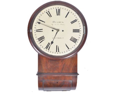 A 19th century Victorian mahogany twin fusee cased station clock with the dial marked for Hughes John. Roman numeral chapter 