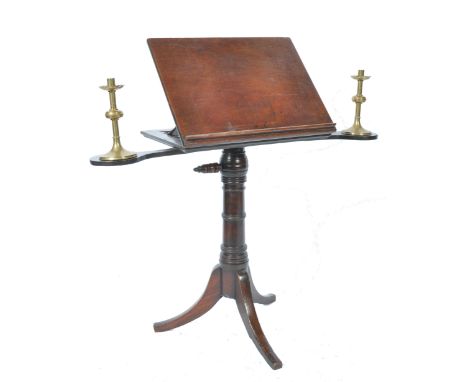 An 18th century George III mahogany adjustable reading stand lectern. Raised on a splayed leg tripod base having central colu