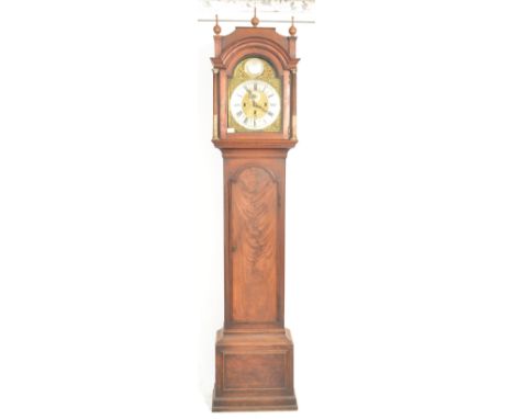 An 18th Century English mahogany cased longcase grandfather clock by James Martin of London. The brass and silvered dial sign